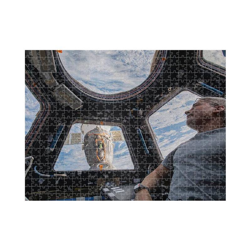 Astronaut Mark Vande Hei Peers At The Earth Below Jigsaw Puzzle