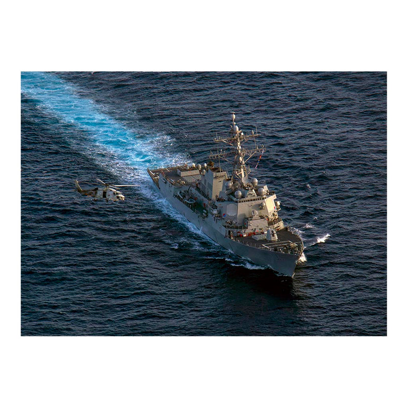 An MH-60S Sea Hawk Flies Over Guided-missile Destroyer USS Sterett (DDG 104) during Annual Exercise 2023 Jigsaw Puzzle