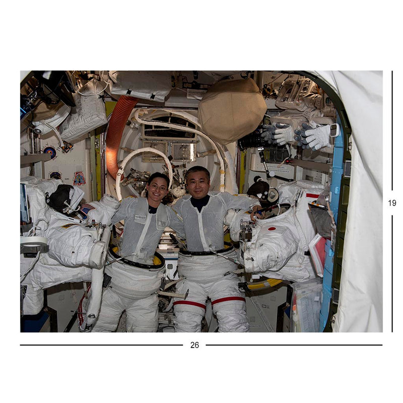 Suiting Up for Their First Spacewalk Jigsaw Puzzle
