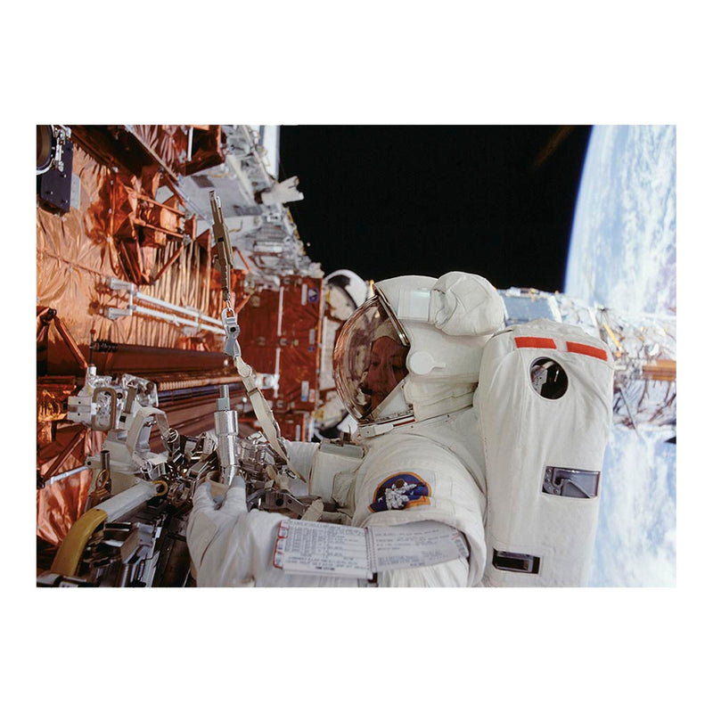 Astronaut Kathryn Thornton Works on Hubble Space Telescope Jigsaw Puzzle