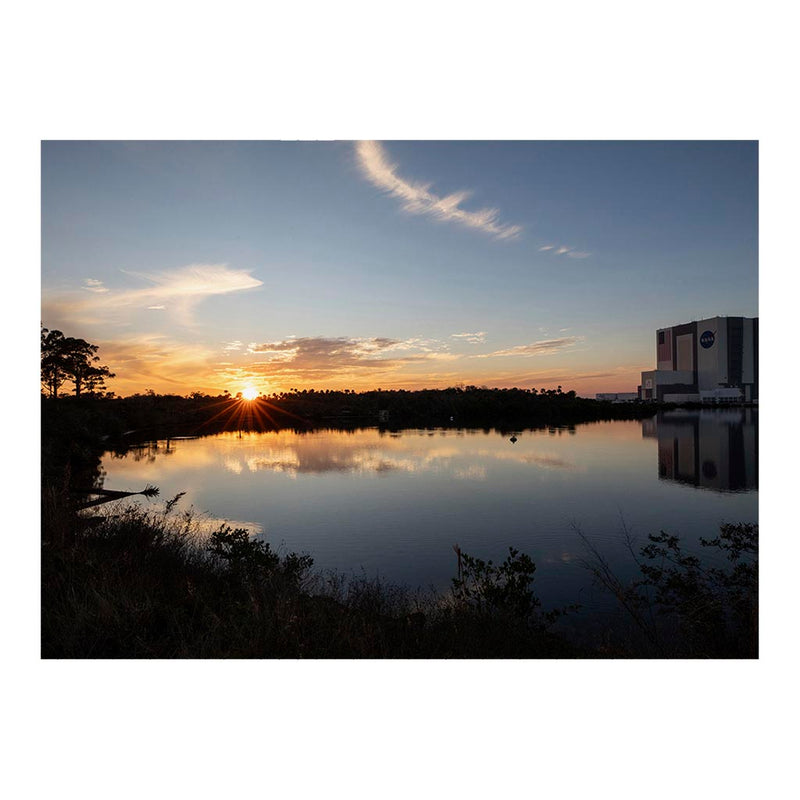 A Floridian Sunset At The Vehicular Assembly Building Jigsaw Puzzle