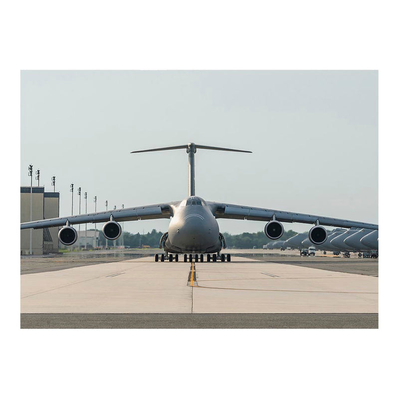 A C-5M Super Galaxy Taxis Down The Flightline Jigsaw Puzzle