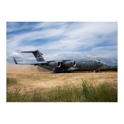 A C-17 Globemaster III Takes Off On A Dirt Runway Jigsaw Puzzle