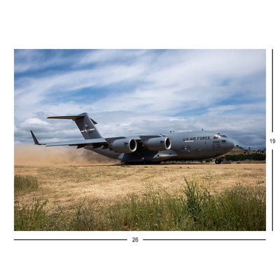 A C-17 Globemaster III Takes Off On A Dirt Runway Jigsaw Puzzle