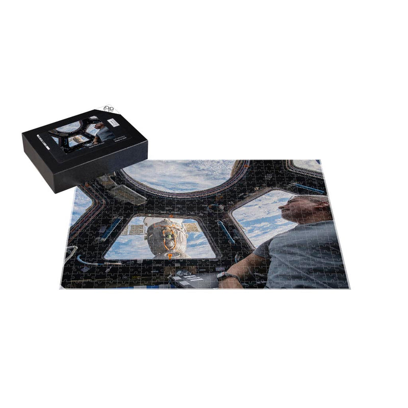 Astronaut Mark Vande Hei Peers At The Earth Below Jigsaw Puzzle